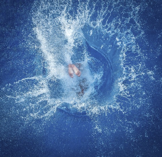 DEU Germany Germany Berlin Splashdiver Christian 'Elvis' Guth at his workplace in the Olympic swimming pool