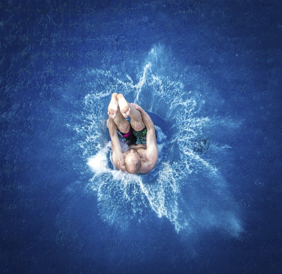 DEU Germany Germany Berlin Splashdiver Christian 'Elvis' Guth at his workplace in the Olympic swimming pool