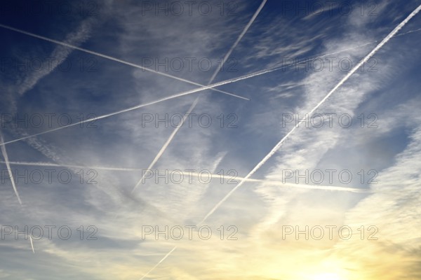 Airplanes with contrails in the sky in Hamburg, Germany
