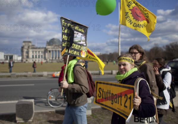 Germany Berlin Anti-nuclear power demonstration in Berlin Mitte. Demonstrators pass through the Reichstag after a demonstration. Germany Berlin protest rally against nuclear power plants. Protesters passing the Reichstag after a demonstration