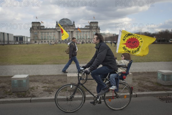 Germany Berlin Anti-nuclear power demonstration in Berlin Mitte. Demonstrators pass the Reichstag Germany Berlin Protest Rally against Nuclear Power Plants. Protesters in front of the Reichstag, the German Parliament