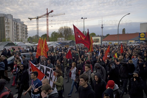 GERMANY May 1 rally passes a Lidl supermarket towards Moritzplatz Germany Berlin May Day protester passing a supermarket