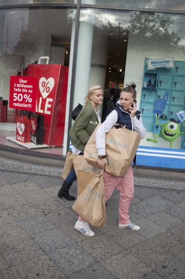 DEU Germany Germany Berlin Young girls with Primark shopping bags on Kurfürstendamm in Berlin