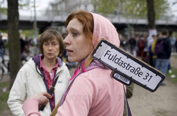 GERMANY A woman with a sign of protest at the May 1 rally in Kreuzberg. Germany Berlin A woman protesting against high rents during the May Day Protest