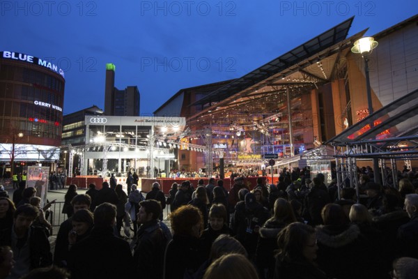 DEU Germany Germany Berlin 64th Berlinale, the international film festival in the German capital. Film fans in front of the Berlinale Palast at the Red Carpet reception