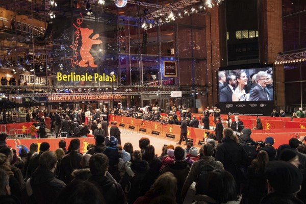 DEU Germany Germany Berlin 64th Berlinale, the international film festival in the German capital. Film fans in front of the Berlinale Palast at the Red Carpet reception