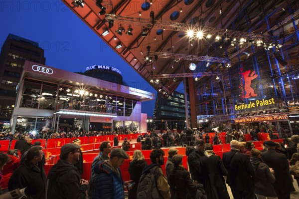 DEU Germany Germany Berlin 64th Berlinale, the international film festival in the German capital. Film fans in front of the Berlinale Palast at the Red Carpet reception