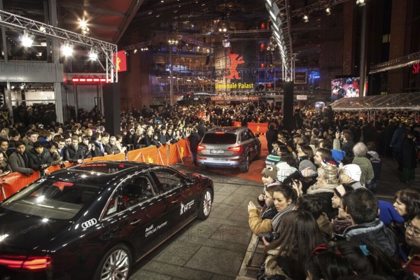 DEU Germany Germany Berlin 64th Berlinale, the international film festival in the German capital. Film fans in front of the Berlinale Palast at the Red Carpet reception