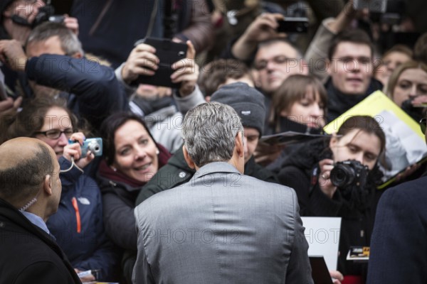 DEU Germany Germany Berlin 64th Berlinale, the international film festival in the German capital. The director of the films 'Monuments Men' George Clooney signs autographs