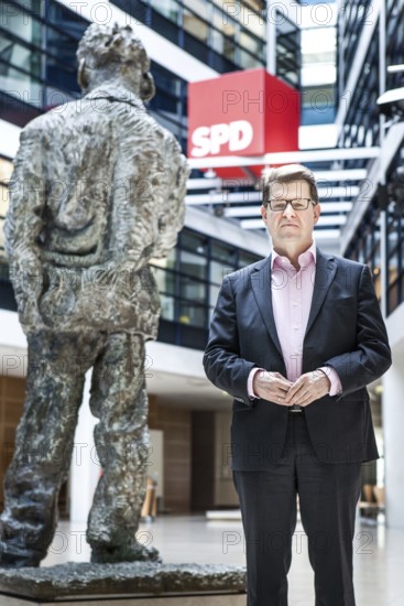 DEU Germany Germany Berlin SPD party vice Ralf Stegner poses with the Willy Brandt memorial at the SPD party headquarters