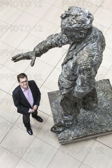 DEU Germany Germany Berlin SPD party vice Ralf Stegner poses with the Willy Brandt memorial at the SPD party headquarters