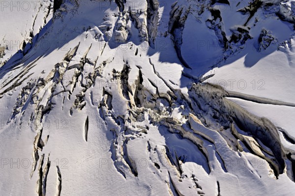 View from the Télécabine Panorama Railway of the glacial crevices of the Glacier du Géant, Chamonix-Mont-Blanc, Haute-Savoie, France