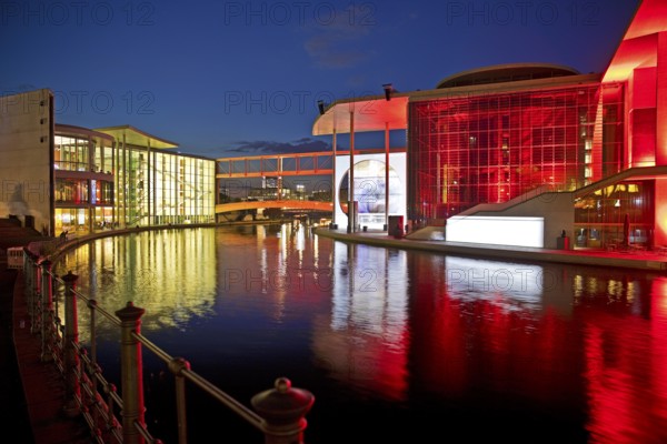 Illuminated Paul Löbe House and Marie Elisabeth Lüders House with the Spree River in the evening, government district, Berlin-Mitte, Berlin, Germany