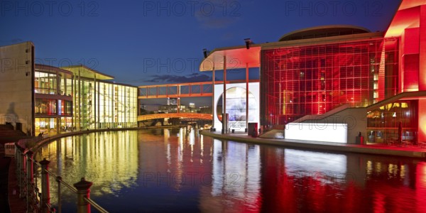 Illuminated Paul Löbe House and Marie Elisabeth Lüders House with the Spree River in the evening, government district, Berlin-Mitte, Berlin, Germany