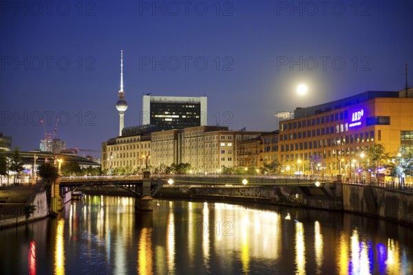 The river Spree in the government district with a full moon, the ARD capital studio and the Berlin TV tower in the evening, Berlin-Mitte, Berlin, Germany