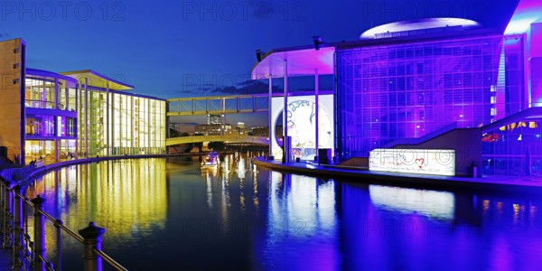 Illuminated Paul Löbe House and Marie Elisabeth Lüders House with the Spree River in the evening, government district, Berlin-Mitte, Berlin, Germany