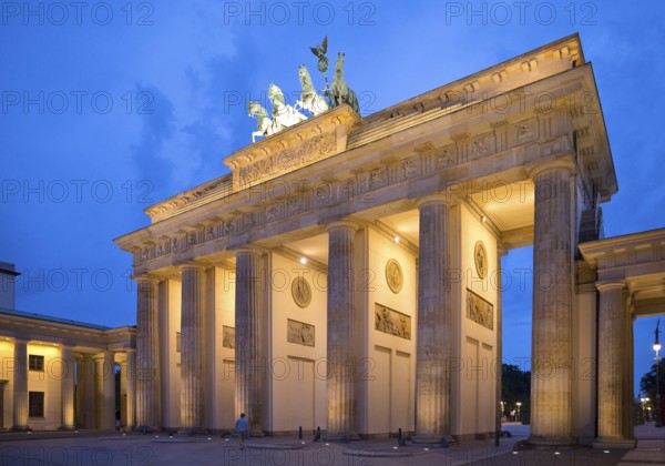 Illuminated Brandenburg Gate in the evening, Berlin, Germany