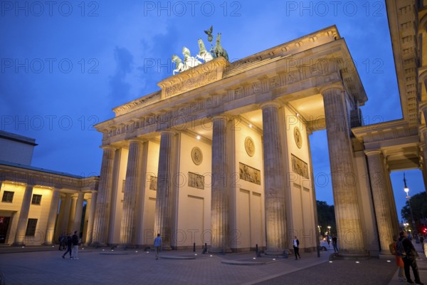 Illuminated Brandenburg Gate in the evening, Berlin, Germany