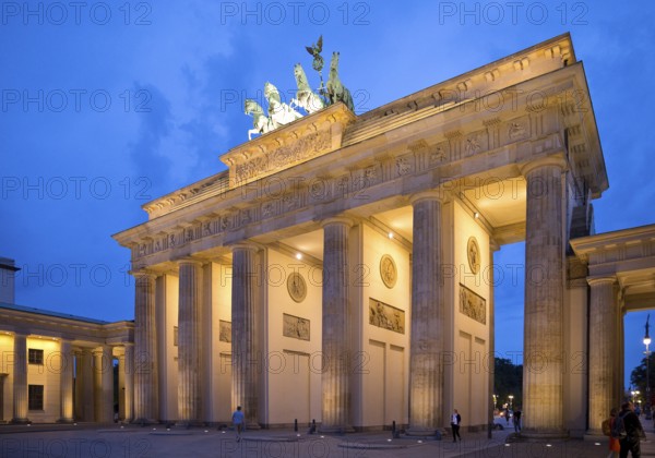 Illuminated Brandenburg Gate in the evening, Berlin, Germany