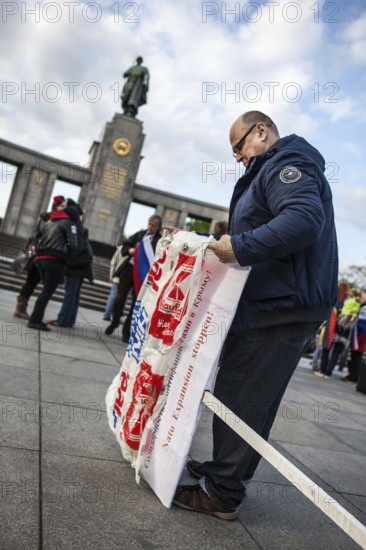 DEU Germany Germany Berlin Pro-Russian demonstration against NATO expansion in Ukraine and for Russian President Putin at the Memorial to the Fallen of the Second World War