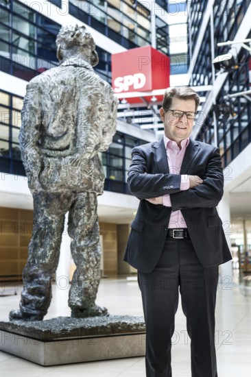 DEU Germany Germany Berlin SPD party vice Ralf Stegner poses with the Willy Brandt memorial at the SPD party headquarters