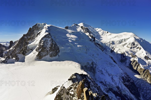 Mont Blanc du Tacul covered with snow from the left, Mont Maudit, Mont-Blanc, Dôme du Goûter, Aiguille du Midi mountain station viewing platform, Chamonix-Mont-Blanc, Haute-Savoie, France