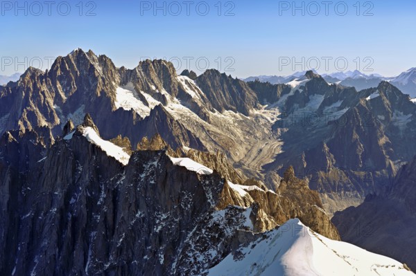 View from the Aiguille du Midi mountain station observation deck of the mountains Aiguille Vert, Les Droites, Les Courtes, Chamonix-Mont-Blanc, Haute-Savoie, France