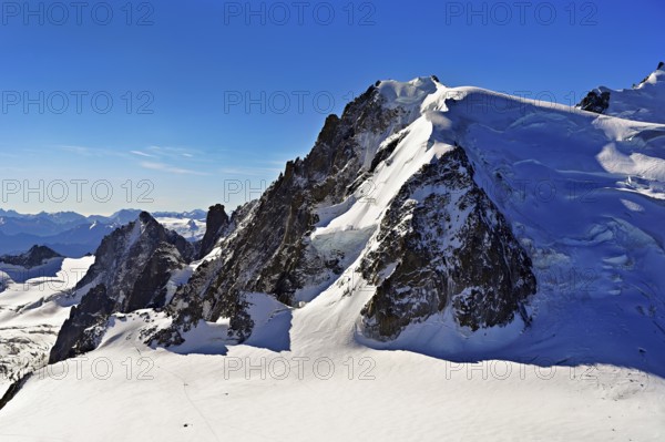 Snow-capped Mont Blanc du Tacul, Aiguille du Midi mountain station viewing platform, Chamonix-Mont-Blanc, Haute-Savoie, France