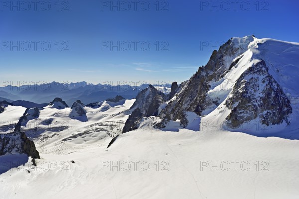 Snow-capped Mont Blanc du Tacul, Aiguille du Midi mountain station viewing platform, Chamonix-Mont-Blanc, Haute-Savoie, France