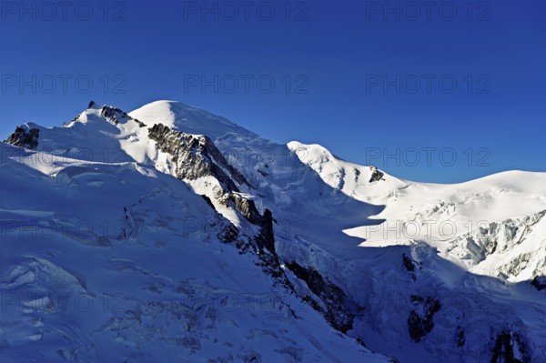 Mont Maudit covered with snow from the left, Mont-Blanc, Dôme du Goûter, Aiguille du Midi mountain station viewing platform, Chamonix-Mont-Blanc, Haute-Savoie, France