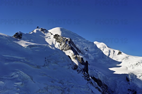 Snowy from left, Mont Maudit, Mont-Blanc, Aiguille du Midi mountain station viewing platform, Chamonix-Mont-Blanc, Haute-Savoie, France