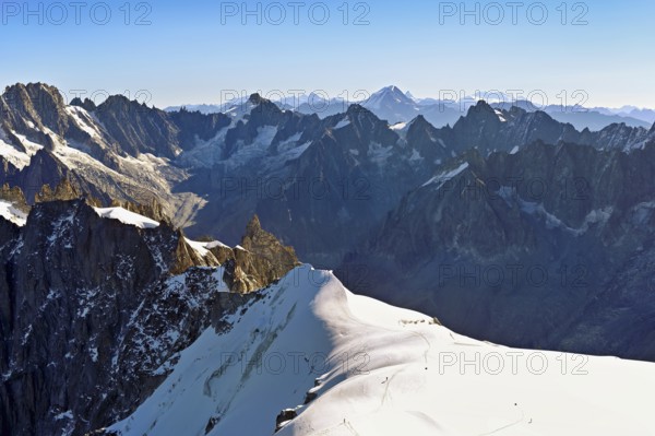 View from the Aiguille du Midi mountain station observation deck of the mountains Les Droites, Les Courtes, Chamonix-Mont-Blanc, Haute-Savoie, France