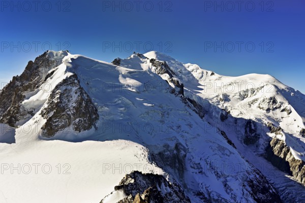 Mont Blanc du Tacul covered with snow from the left, Mont Maudit, Mont-Blanc, Dôme du Goûter, Aiguille du Midi mountain station viewing platform, Chamonix-Mont-Blanc, Haute-Savoie, France
