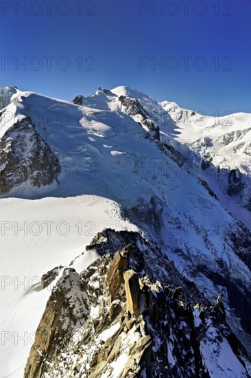 Mont Blanc du Tacul covered with snow from the left, Mont Maudit, Mont-Blanc, Dôme du Goûter, Aiguille du Midi mountain station viewing platform, Chamonix-Mont-Blanc, Haute-Savoie, France