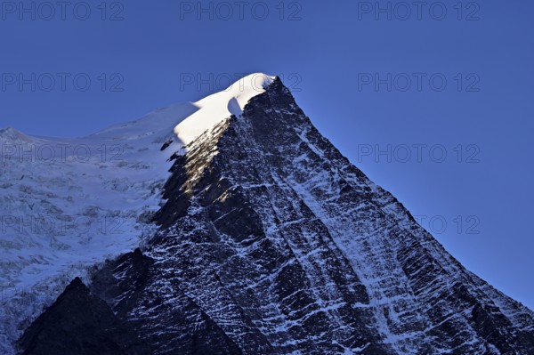 Snow-covered Aiguille du Goutier, Chamonix-Mont-Blanc, Haute-Savoie, France