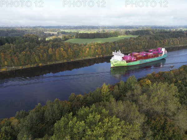 Drone view of container ship ECO OSTRO in autumn in the Kiel Canal, NOK, Kiel Canal, Kiel Canal, Schleswig-Holstein, Germany