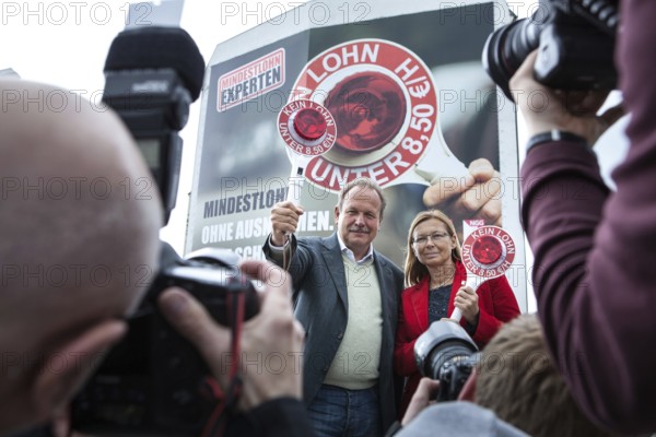 DEU Germany Germany Berlin Michaela Rosenberger and Frank Bsirke presenting a campaign on the minimum wage in front of a giant poster in Berlin-Mitte