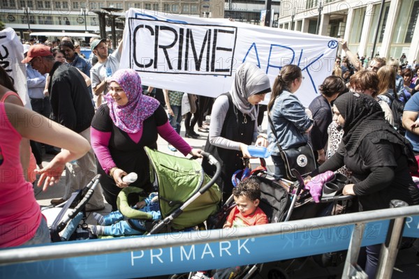DEU Germany Germany Berlin Opening of a Primark movie at Alexanderplatz. Protests by several groups against cheap fashion and product conditions