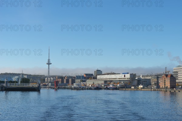 Harbor, Baltic Sea, city view Kiel, Kiel Fjord, shipping traffic, CAP adventure center, Hörnbrücke, folding bridge, telecommunications tower or television tower, haze layer, sunshine, blue sky, Schleswig-Holstein, Germany