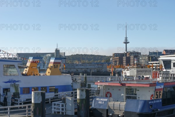 Port, Baltic Sea, Kiel Fjord, shipping traffic, regular ferry service, city view, telecommunications tower or television tower, sunshine, blue sky, Schleswig-Holstein, Germany