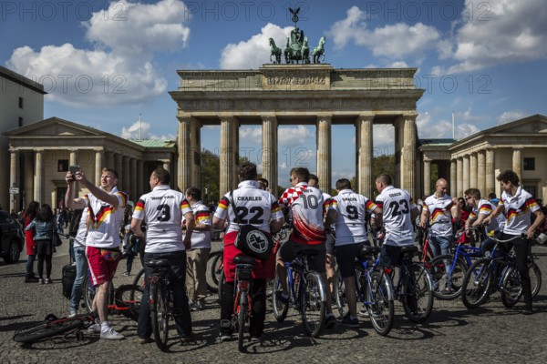 DEU Germany Germany Berlin A British Ruby team with their bikes and jerseys with the colors of the German national soccer team