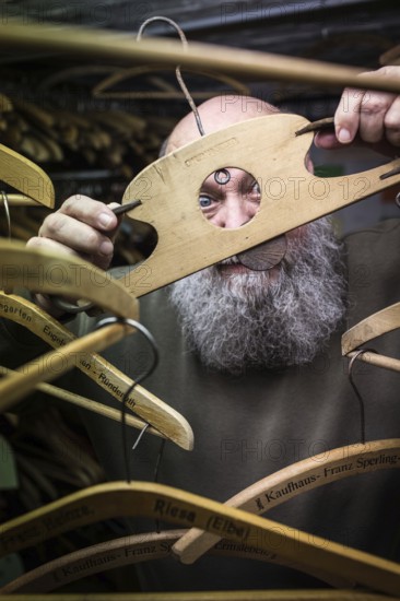 DEU Germany Germany Berlin iron collector Eberhard Rhode from Berlin-Karlshorst with his collectibles
