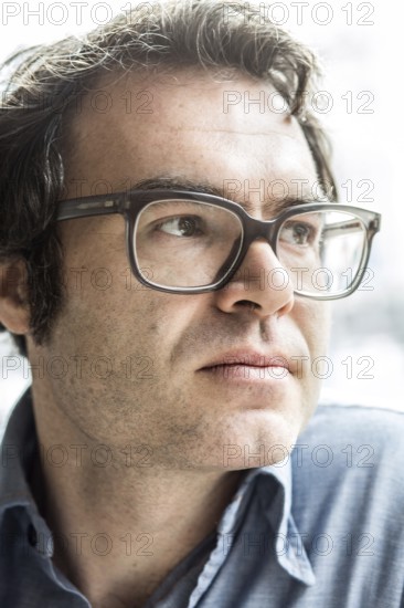 DEU Germany Germany Berlin The writer Phillip Schönthaler during a portrait appointment at the Morena Cafe in Kreuzberg