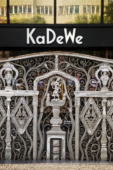 KaDeWe logo, Kaufhaus des Westens, with old forged grid in front of the entrance when the shop is closed, Charlottenburg, Berlin, Germany