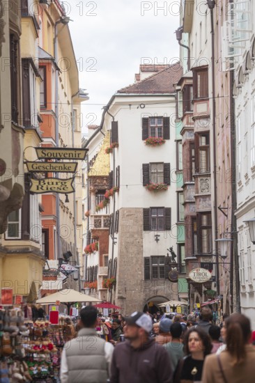 Hofgasse with historic houses and lots of people, old town, Innsbruck, Tyrol, Austria