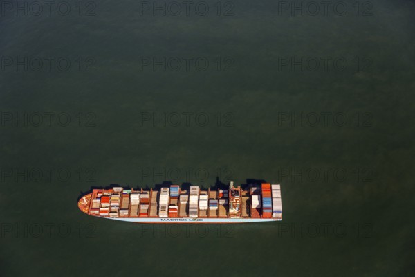 Container ship Maersk Lavras at anchor, aerial view, cargo ships at anchor off Spiekeroog, shipping line, shipping route, at sea, coastal waters, Spiekeroog, North Sea, North Sea island, East Frisian Islands, Lower Saxony, Germany, Europe, birds-eyes view, aerial view, aerial photography, aerial photography, overview, bird's eye view
