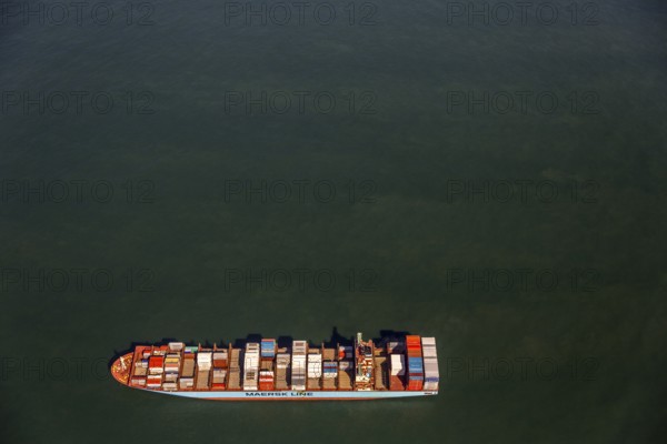 Container ship Maersk Lavras at anchor, aerial view, cargo ships at anchor off Spiekeroog, shipping line, shipping route, at sea, coastal waters, Spiekeroog, North Sea, North Sea island, East Frisian Islands, Lower Saxony, Germany, Europe, birds-eyes view, aerial view, aerial photography, aerial photography, overview, bird's eye view