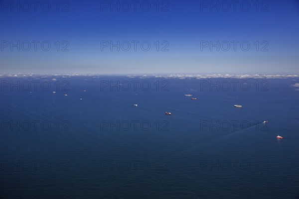 Aerial view, cargo ships at anchor off Spiekeroog, shipping lane, shipping route, at sea, coastal waters, Wangerooge, North Sea, North Sea island, East Frisian Islands, Lower Saxony, Germany, Europe, birds-eyes view, aerial view, aerial photography, aerial photography, overview, bird's eye view