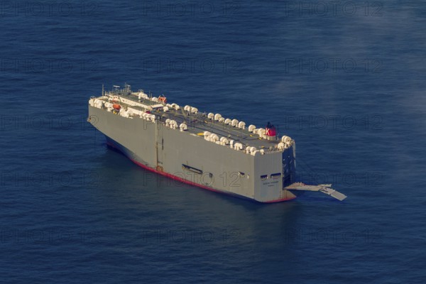 Cargo ship, anchoring car transporter Ocean Highway Panama, aerial view, cargo ships anchored off Spiekeroog, shipping lane, shipping route, at sea, coastal waters, Wangerooge, North Sea, North Sea island, East Frisian Islands, Lower Saxony, Germany, Europe, birds-eyes view, aerial view, aerial photography, aerial photography, overview, bird's eye view