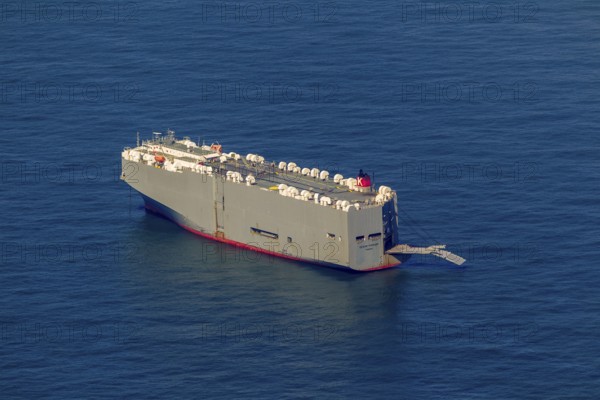 Cargo ship, anchoring car transporter Ocean Highway Panama, aerial view, cargo ships anchored off Spiekeroog, shipping lane, shipping route, at sea, coastal waters, Wangerooge, North Sea, North Sea island, East Frisian Islands, Lower Saxony, Germany, Europe, birds-eyes view, aerial view, aerial photography, aerial photography, overview, bird's eye view